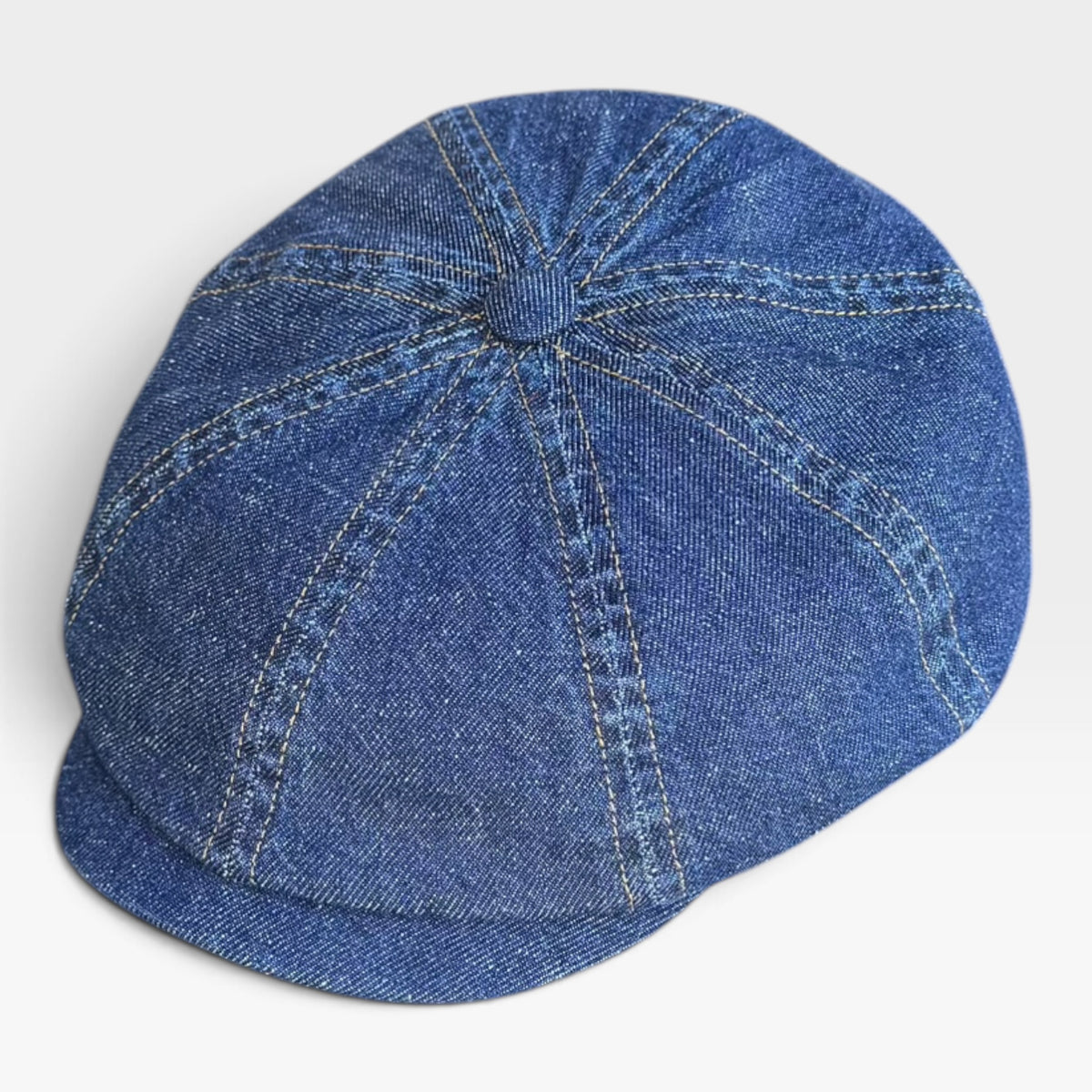 Vista dall'alto della coppola irlandese in denim 8 spicchi blu con cuciture a vista