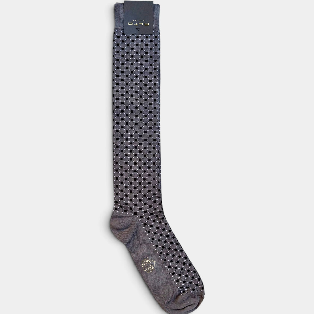 Calzino lungo grigio con motivo quadro a pois Alto Milano disteso