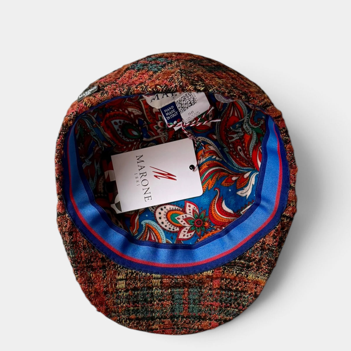 Coppola in Lana Boucle' Color Ruggine e Petrolio
